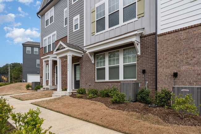 Building Photo - Breathtaking, Spacious Townhome in Parc at...