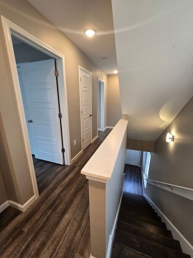 Building Photo - Live Steps from the Highland Strip — Share...