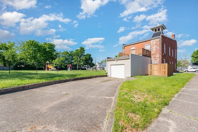 Building Photo - Funky Firehouse Renovated into Modern 2 BD...