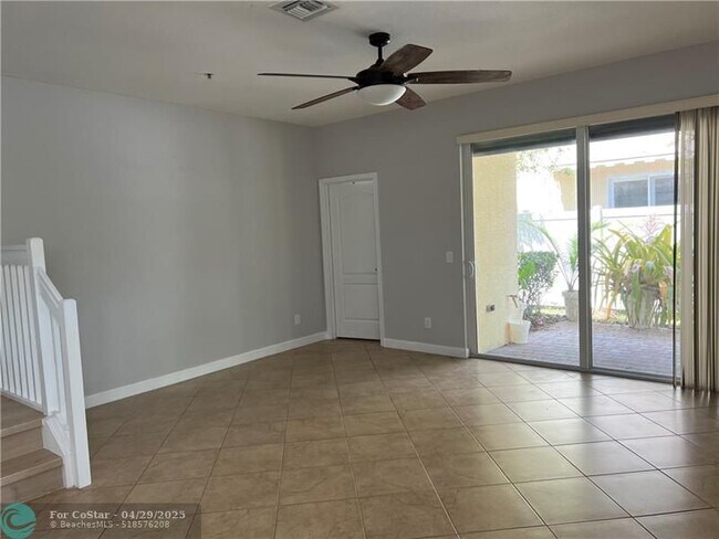Building Photo - 9428 SW Merlin Ct