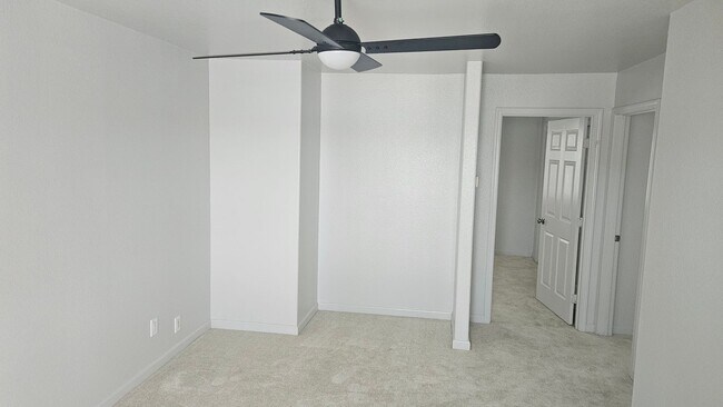 Building Photo - Three Bedroom Two and a half bath house, 2 car garage, central air. Available now.