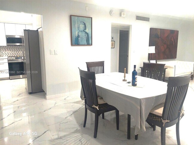 Building Photo - 5005 Collins Ave