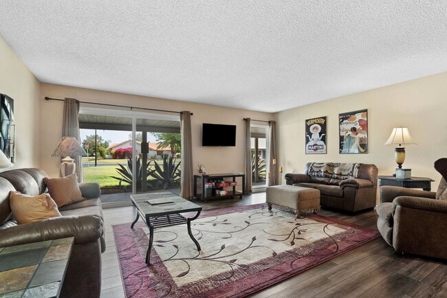 Building Photo - This beautifully appointed 3-bedroom, 2-bathroom condo seasonal rental Located in Leisure World A...