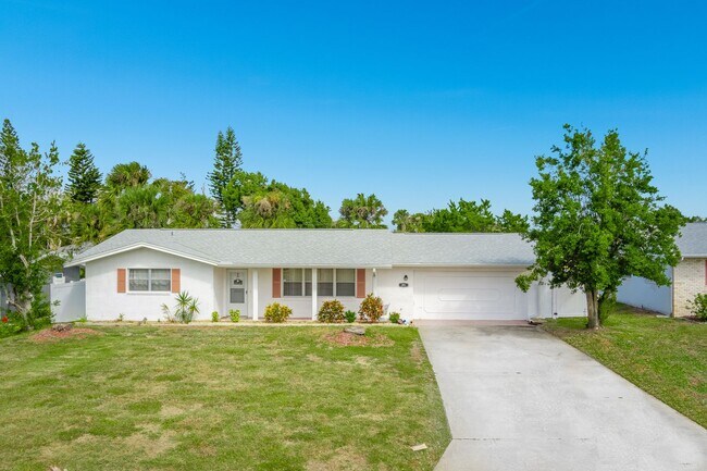 Building Photo - Welcome to your Perfect Beachside Retreat!