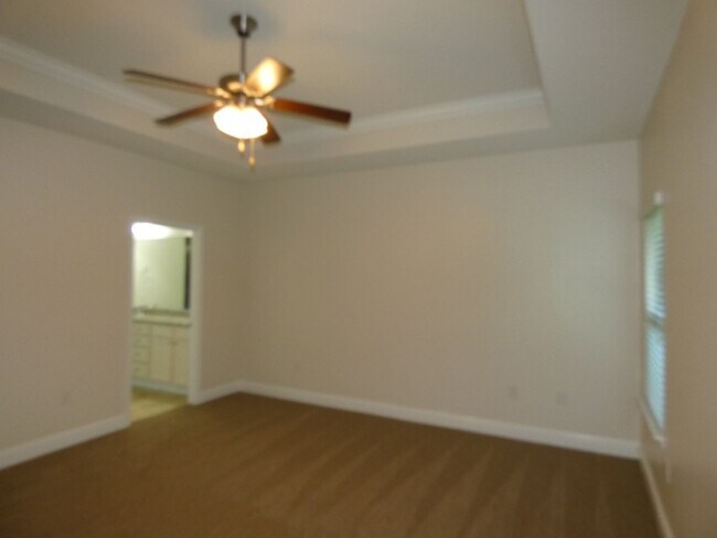 Building Photo - Spacious 5-Bedroom Home - Heart of Pace