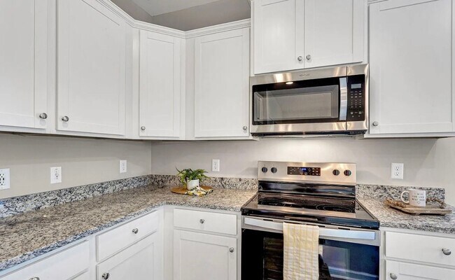 Building Photo - Stunning 3/2.5 Townhome Available Now!