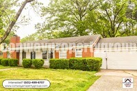 Building Photo - 718 S Donaghey Ave