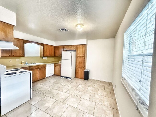 Building Photo - Prime Location! Fresh Paint – Charming 2BR...