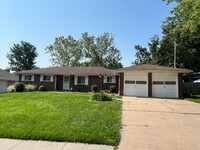 Building Photo - Corner Lot Beauty with Basement & Big Back...