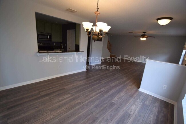 Building Photo - 5456 River Rock Rd