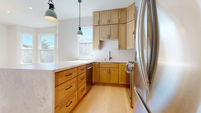 Building Photo - Modern, Convenient, Bright, Renovated 3BR/1BA Top Floor Flat with Dishwasher & In Unit Laundry