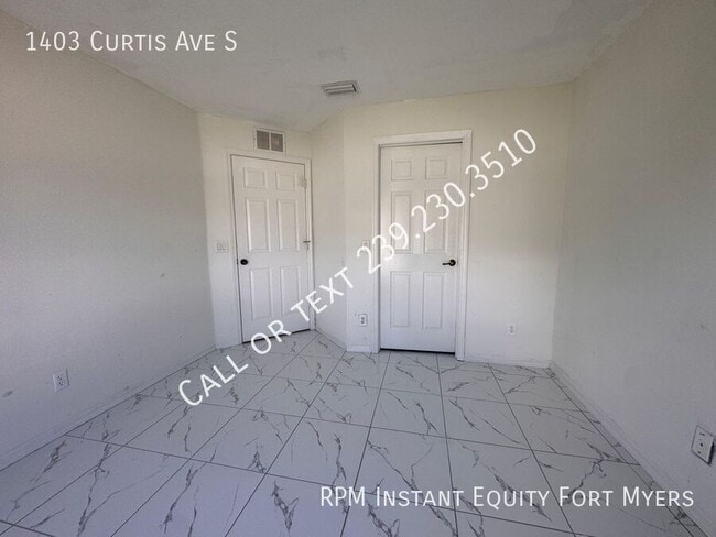 Building Photo - 1403 Curtis Ave S