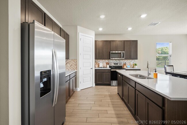 Building Photo - 8588 Dahlia Cir