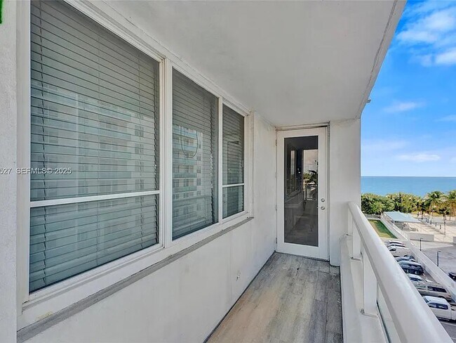 Building Photo - 5005 Collins Ave