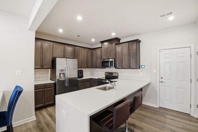 Building Photo - Step into a beautifully designed contemporary residence that exudes style and comfort at every turn.