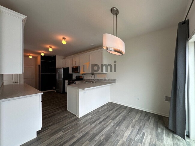 Building Photo - 1765 E 110th Pl