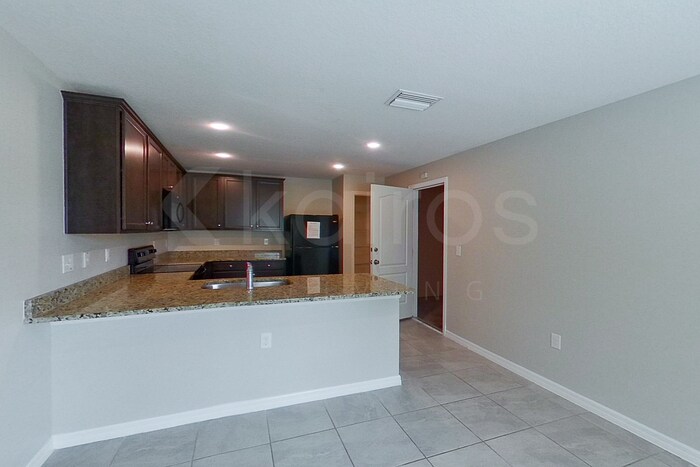 Building Photo - 8473 Indian Laurel Ln