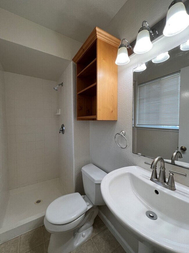Building Photo - Spacious 1,196 Square Foot  4BR Home Across from Technology High School | Large Yard & 2-Car Garage"