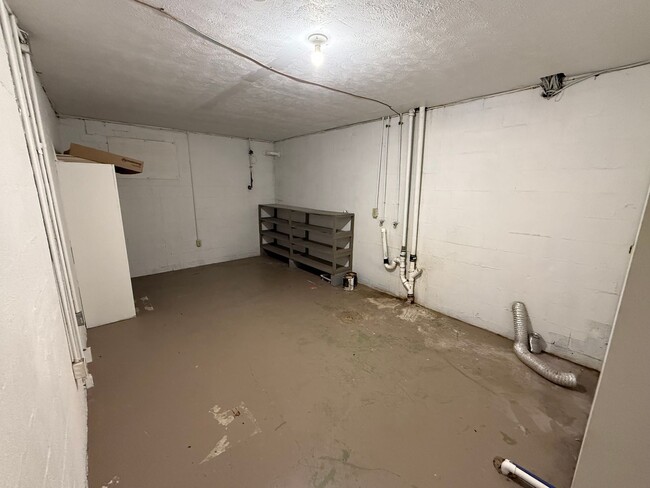 Building Photo - Updated 4BR Home with Finished Basement & Level Yard