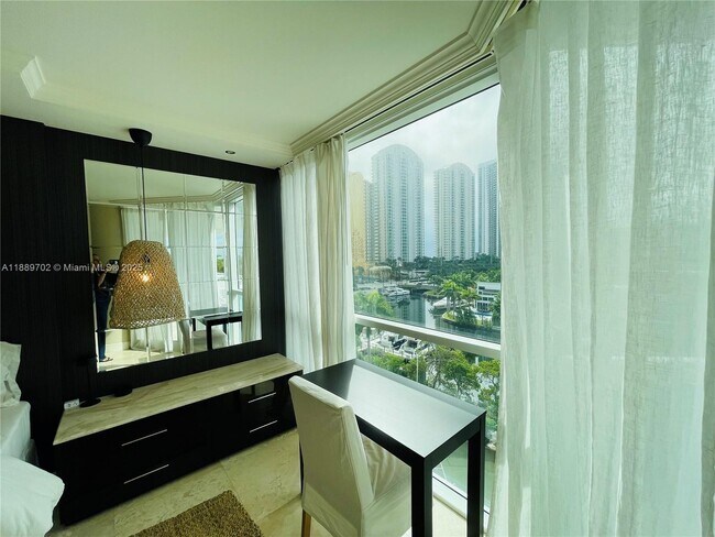 Building Photo - 16400 Collins Ave