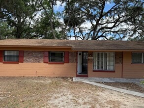 Building Photo - Water View - Remodeled 4 bedroom and 2 bath -  Sunroom