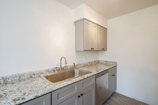 Building Photo - Updated home with large backyard & 2 car g...