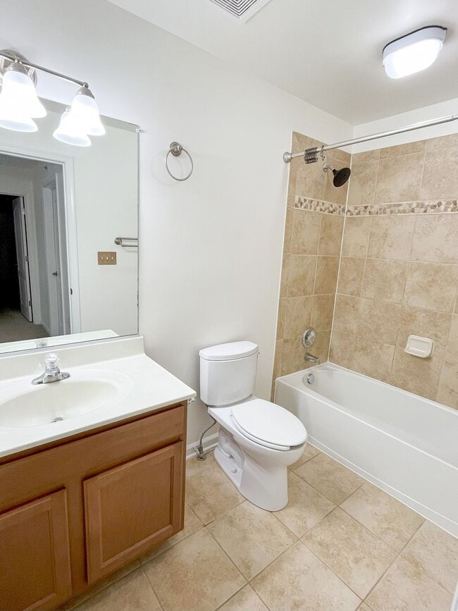 Building Photo - Sizable End Unit Townhome in Wheaton w/ 2 Car Garage!