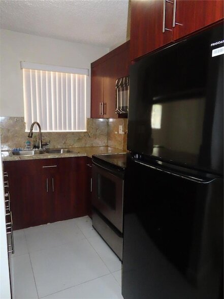 Building Photo - 13894 SW 65th Terrace