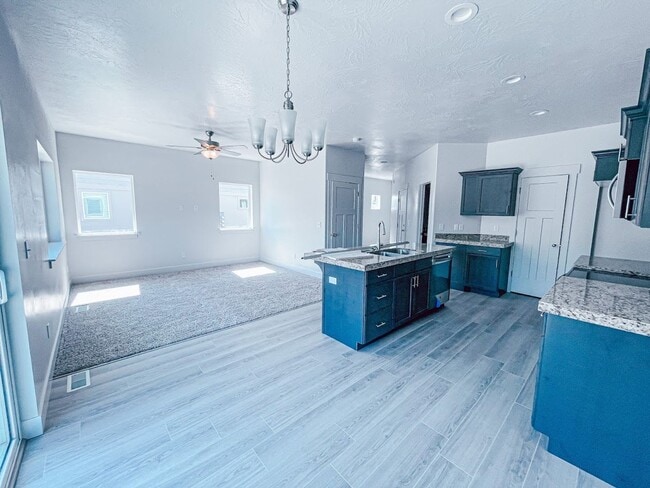 Building Photo - Brand New Idyllic Townhome in AF