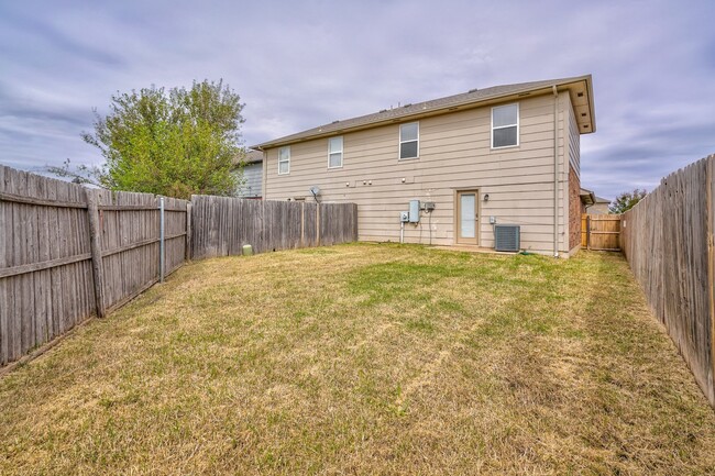 Building Photo - Charming 2-Story Duplex in Gated Community...