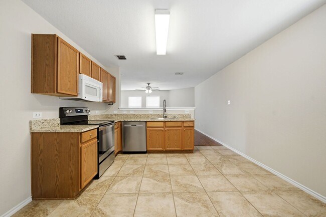 Building Photo - Easy Living with Wood Floors & Fireplace – Royse City, TX