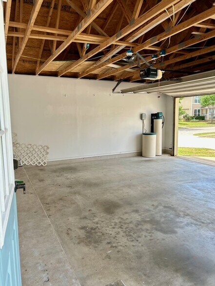 Two car garage with overhead storage - 1702 Sand Hills Dr