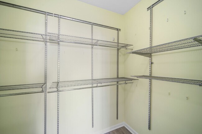 Building Photo - Two-bedroom, two-bathroom model with a den, located on the third floor.