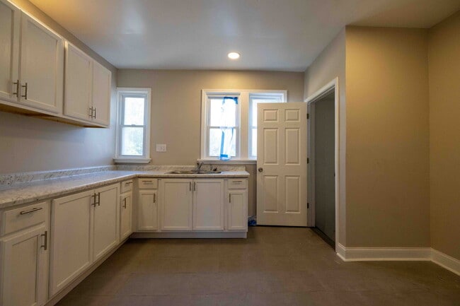Building Photo - Stylish, Updated & Ready to Call Home