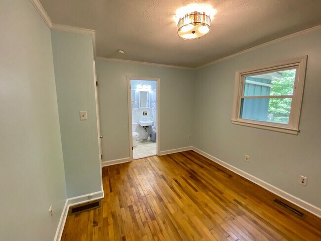 Building Photo - Black Mountain - Wooded lot, One-Level home, Room to Garden!