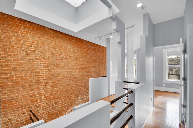 Building Photo - Architecturally Stunning Curtis Park Townhome With Historic Charm