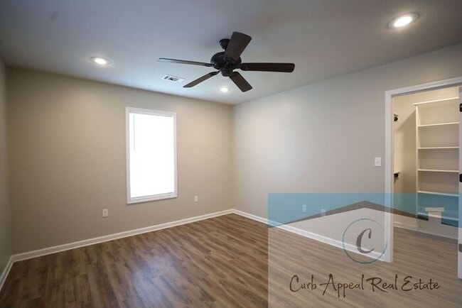 Building Photo - Move in special $800!! Luxury 2 bed, 1 bath duplex - recent construction!! Washer, dryer and inte...