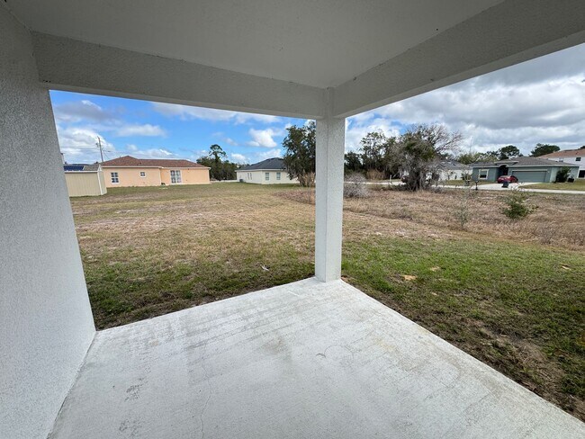 Building Photo - Spacious 4-Bedroom Home in Poinciana – Internet Included & No HOA Approval Required