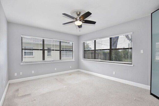 Building Photo - Gorgeous Waterfront 3/2 Mid-century Modern Style Home with a Covered Patio and a Large Backyard i...