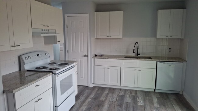 Building Photo - 5830 NW Kinyon Ave