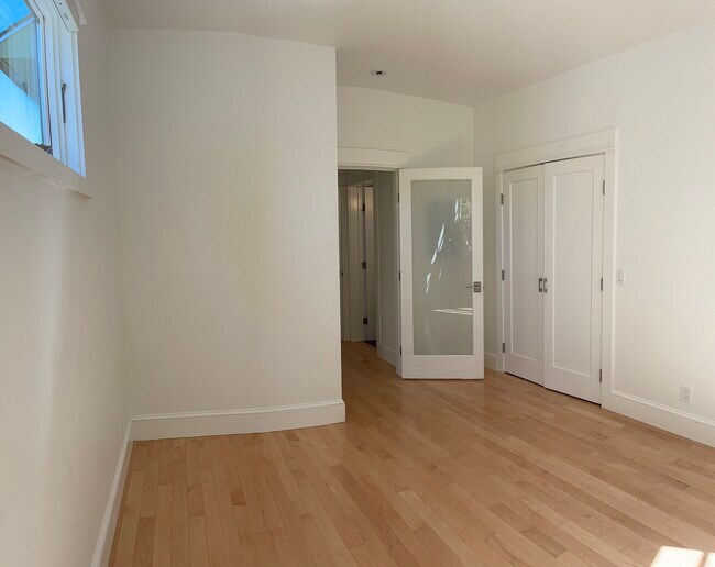 Bedroom view to hallway, storage closet, and hallway storage closet - 3918 Webster St