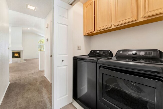 Building Photo - Vaulted Ceilings, Cozy Fireplace & Desirable Single-Story Living Near The Lakes!