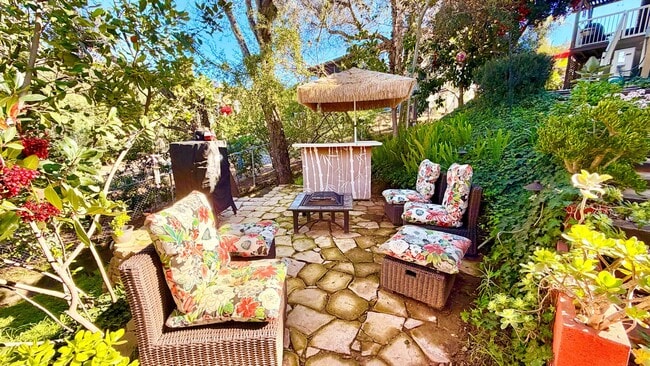 Building Photo - Darling Open Studio Layout Guest Home unit on Lush and Beautifully Landscaped Private Property in...