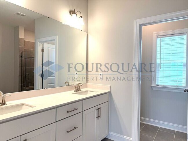 Building Photo - Spacious Corner-Lot Home with Guest Suite, Screened Porch & Detached 2-Car Garage – Resort-Style ...