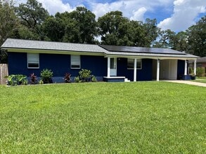 Building Photo - Updated 3BR | Solar Panels + Fenced Yard