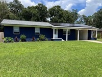 Building Photo - Updated 3BR | Solar Panels + Fenced Yard