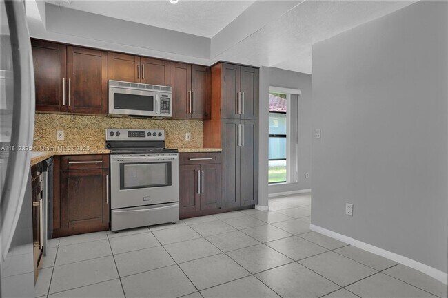 Building Photo - 11054 SW 136th Ct