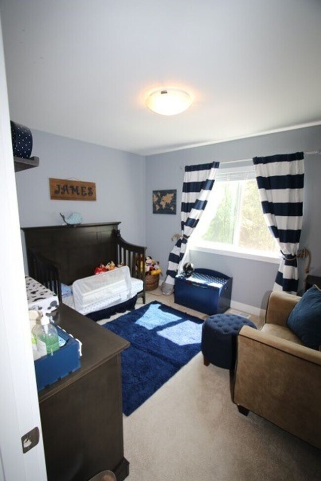Building Photo - Modern and Spacious 4 Bedroom Condo in East Anchorage!