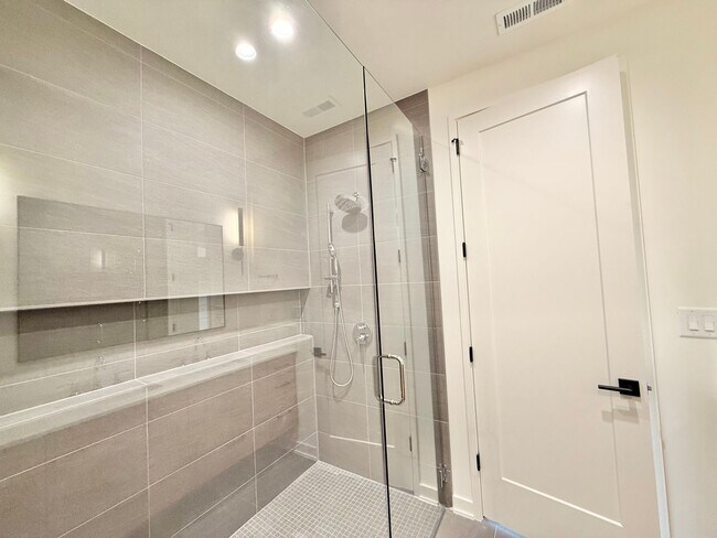 Building Photo - Luxurious New Construction 4BD, 2.5BA Raleigh Townhome with a Rooftop Terrace in a Prime Location...