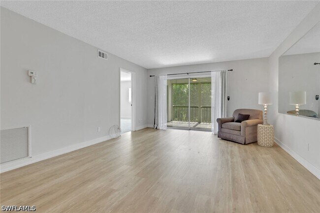 Building Photo - 4912 Tamiami Trl E